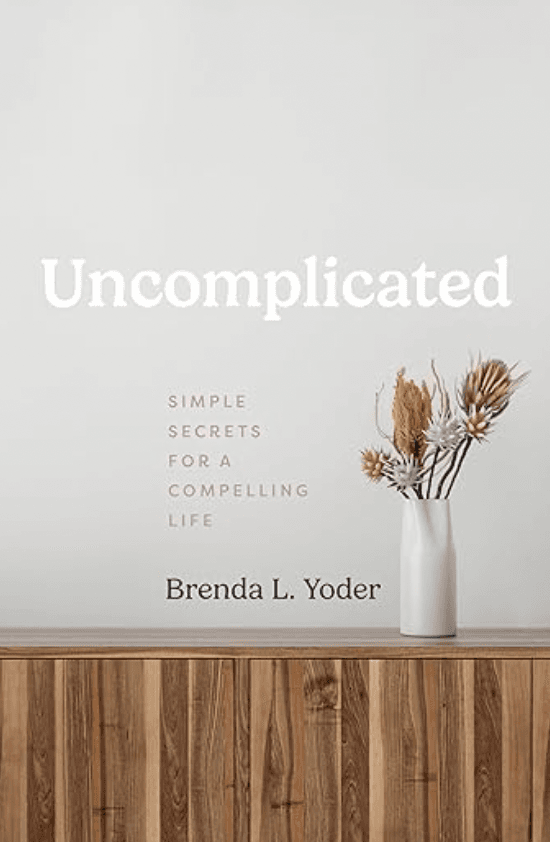 Brenda Yoder with her book Uncomplicated